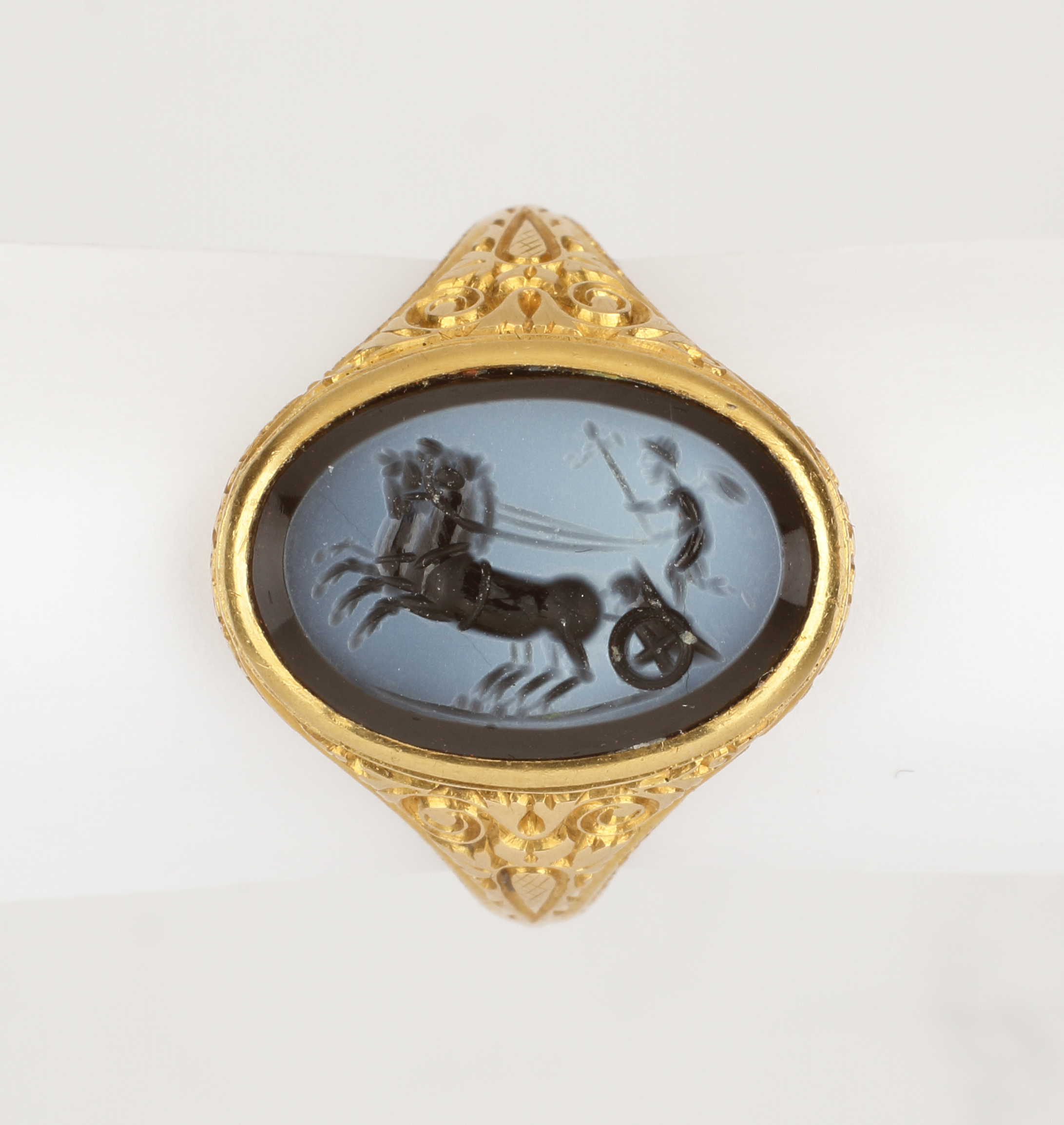A Gold Finger-Ring Set with a Nicolo Intaglio of Eros Driving a ‘Biga’ Two-Horse Chariot